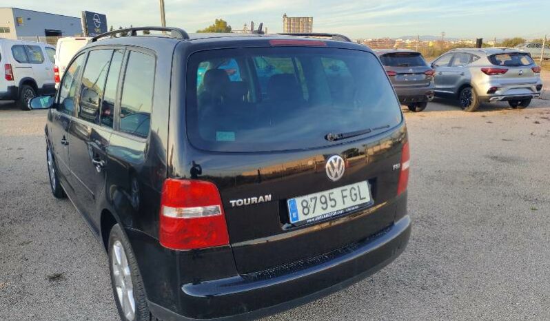 
								Volkswagen Touran Advance 1.6 FSI 116 CV completo									